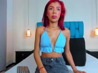 I am a Latin girl with a beauty that does not go unnoticed. My figure is slim and elegant, and my deep red hair gives my style a bold and different touch. My look says a lot about me: I can be sweet, but also very naughty when I want to.

I love connecting with those who accompany me, creating a close, fun and full of complicity. I enjoy showing my most sensual side, but also my authentic and natural essence.

I am passionate, charismatic and a little mysterious... enough to leave you wanting to discover more about me.